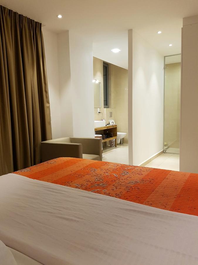 Suncity Hotel Apartment Acra Exterior foto